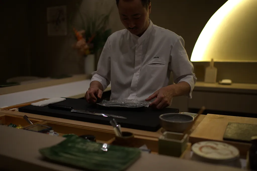 The chef working behind the counter during service