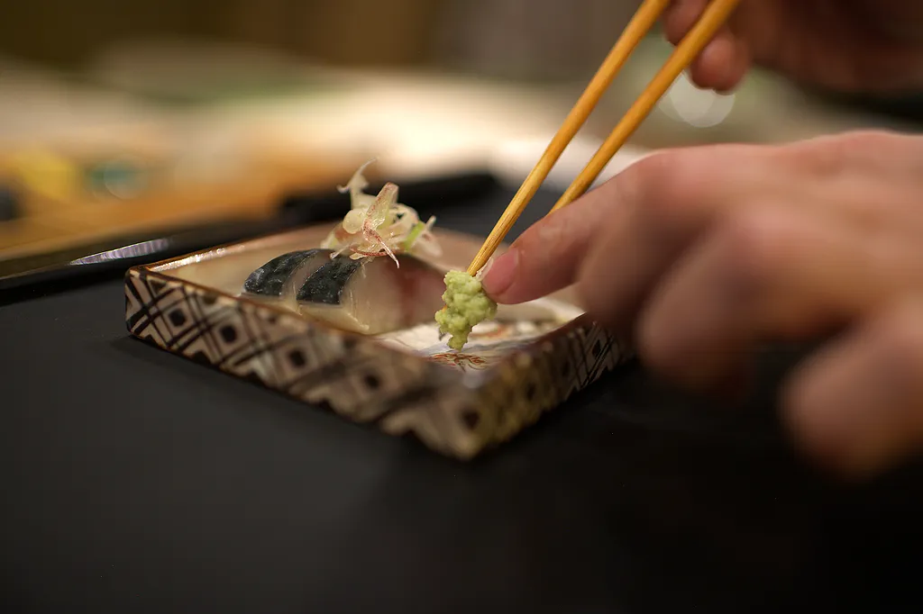 A course being finished with chopsticks